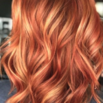 “Strawberry copper hair color trend at Avalon Salon”
